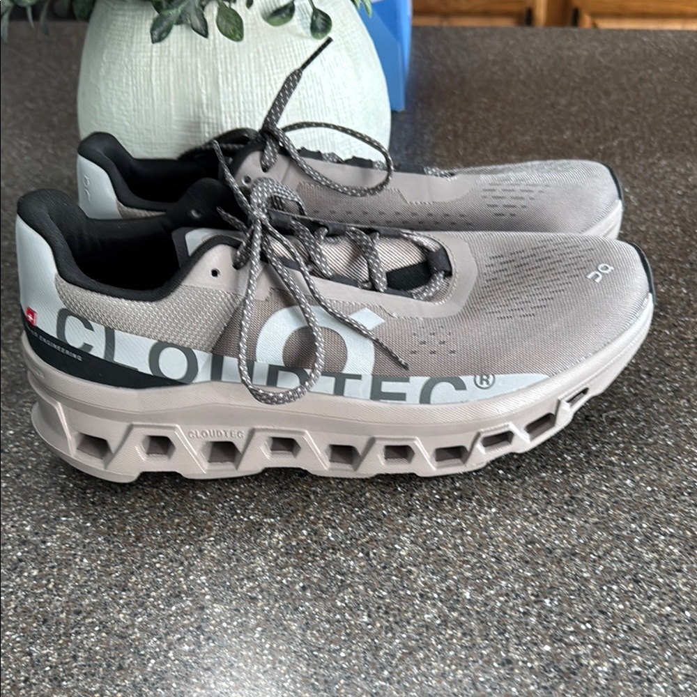 On Running Cloudmonster Sneakers in Taupe and Black